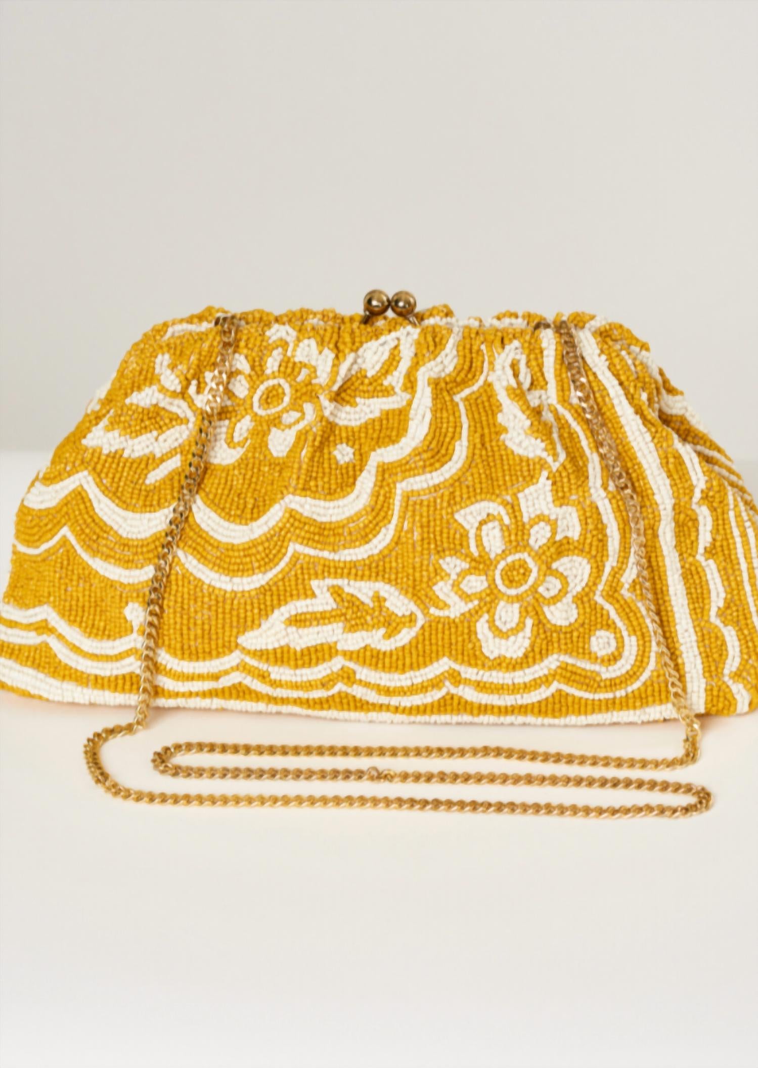 Женская клатч Sylvie с бусинами в горчично-желтом цвете M.A.B.E.
Женская клатч Sylvie с бусинами в горчично-желтом цвете M.A.B.E.
