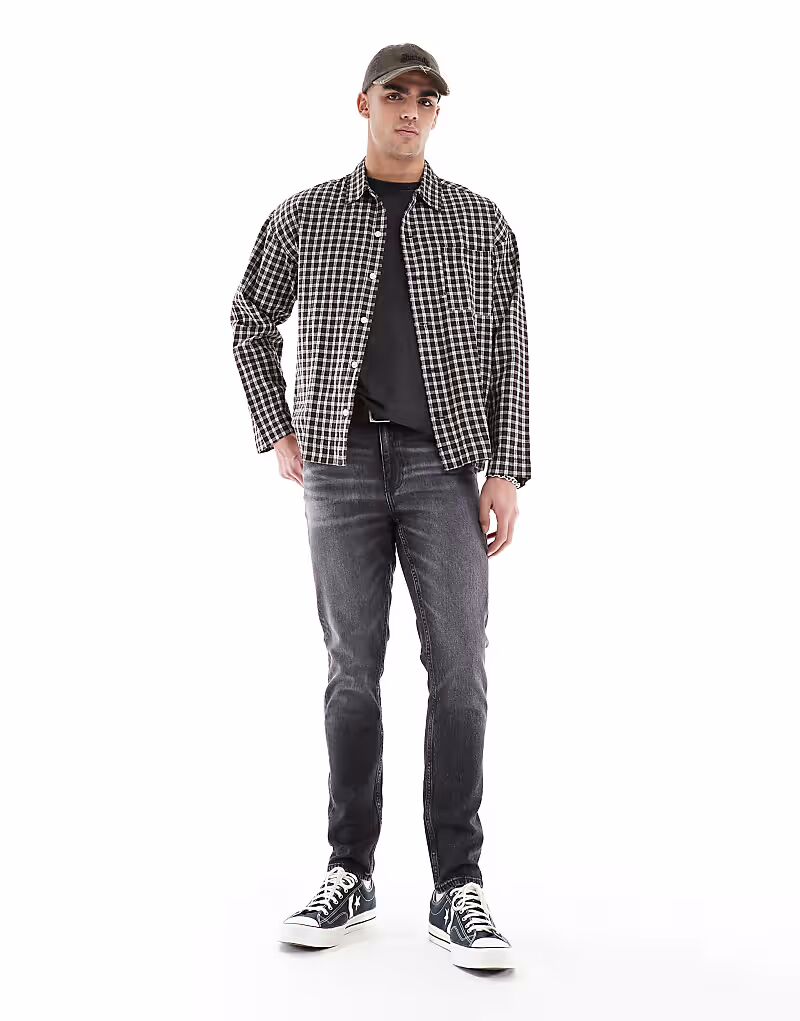 Узкие джинсы ASOS DESIGN черного цвета
Узкие джинсы ASOS DESIGN черного цвета