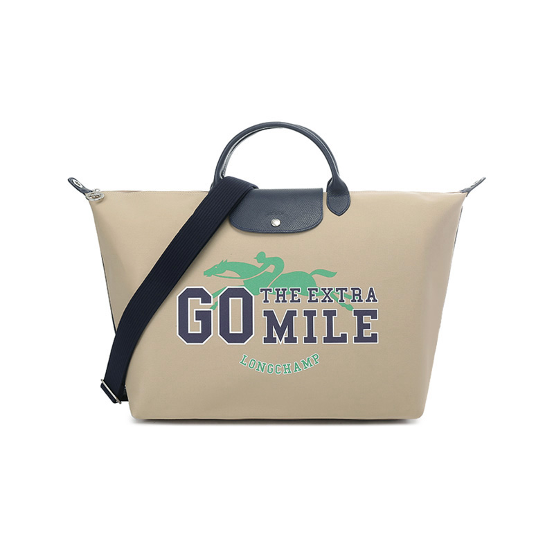 LONGCHAMP Сумка через плечо Le Pliage Collection из ткани с кожаными деталями
LONGCHAMP Сумка через плечо Le Pliage Collection из ткани с кожаными деталями