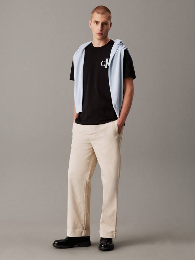 Хлопчатобумажная университетская футболка свободного покроя с коротким рукавом Calvin Klein, черный
Хлопчатобумажная университетская футболка свободного покроя с коротким рукавом Calvin Klein, черный