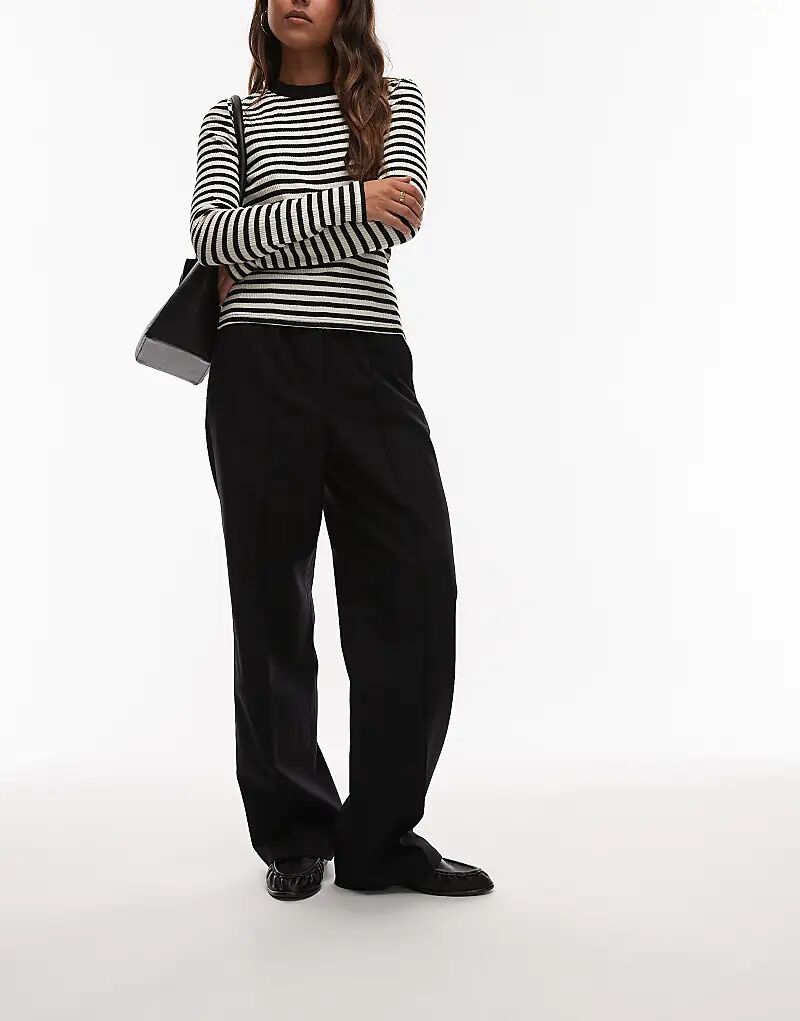 Брюки прямого кроя ARKET из шерстяной фланели с резинкой на талии черного цвета
Брюки прямого кроя ARKET из шерстяной фланели с резинкой на талии черного цвета