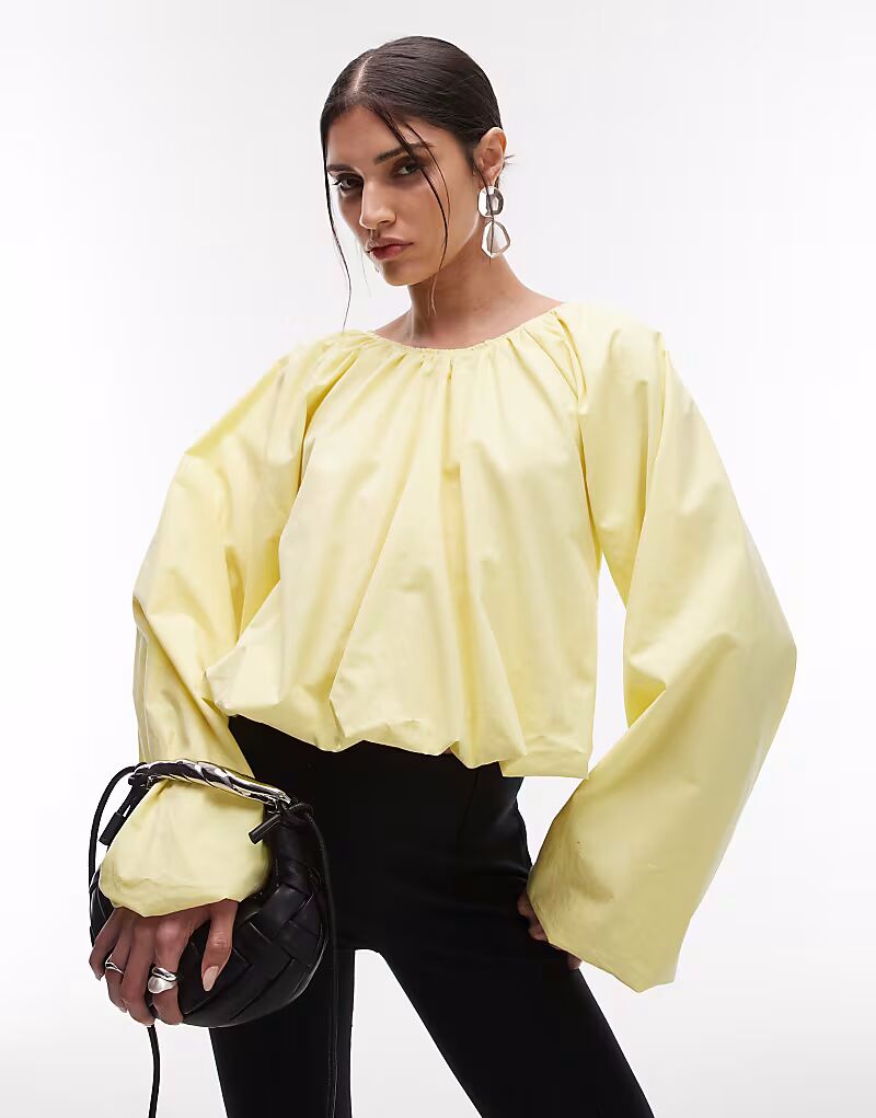 Блузка ASOS DESIGN с объемным подолом и пузырьками лимонного цвета
Блузка ASOS DESIGN с объемным подолом и пузырьками лимонного цвета