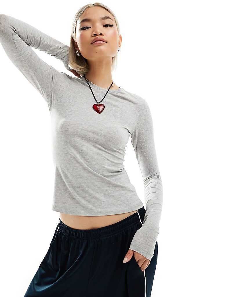 Серая меланжевая футболка узкого кроя с длинными рукавами Weekday
Серая меланжевая футболка узкого кроя с длинными рукавами Weekday