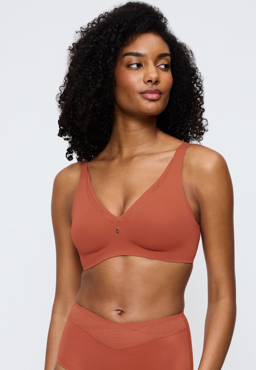 Бюстье Triumph TRUE SHAPE SENSATION MINIMIZER-OHNE, Desert Sunset/Orange
Бюстье Triumph TRUE SHAPE SENSATION MINIMIZER-OHNE, Desert Sunset/Orange