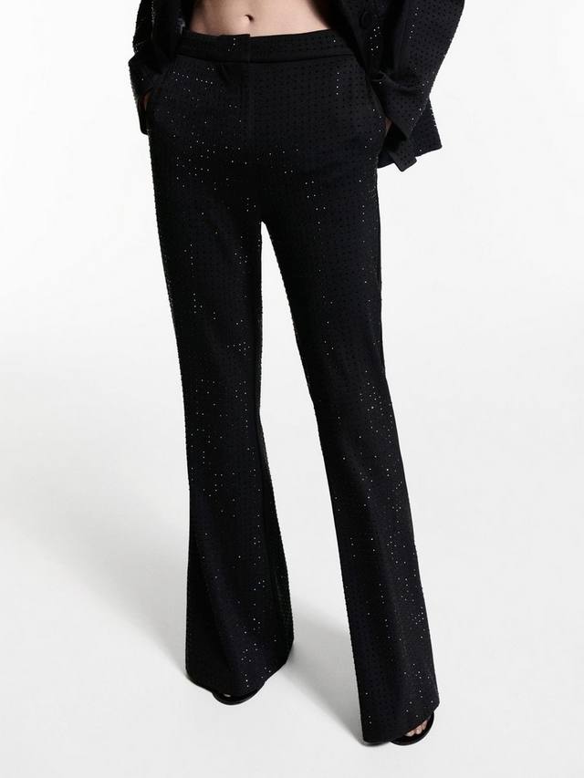 Расклешенные брюки с блестящими украшениями Mango, черный
Расклешенные брюки с блестящими украшениями Mango, черный