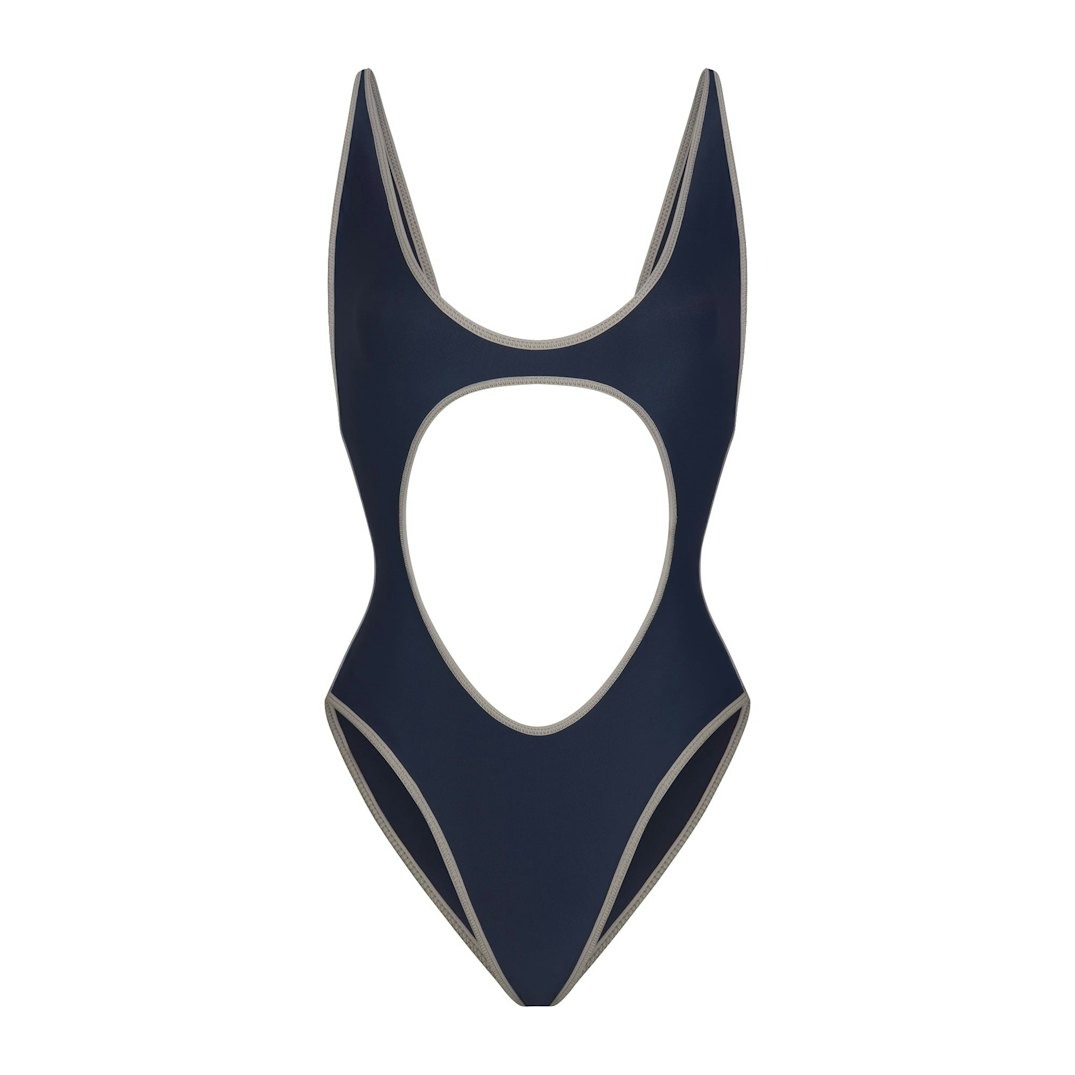 Купальник SKIMS Signature Swim Cut Out One, темно-синий
Купальник SKIMS Signature Swim Cut Out One, темно-синий