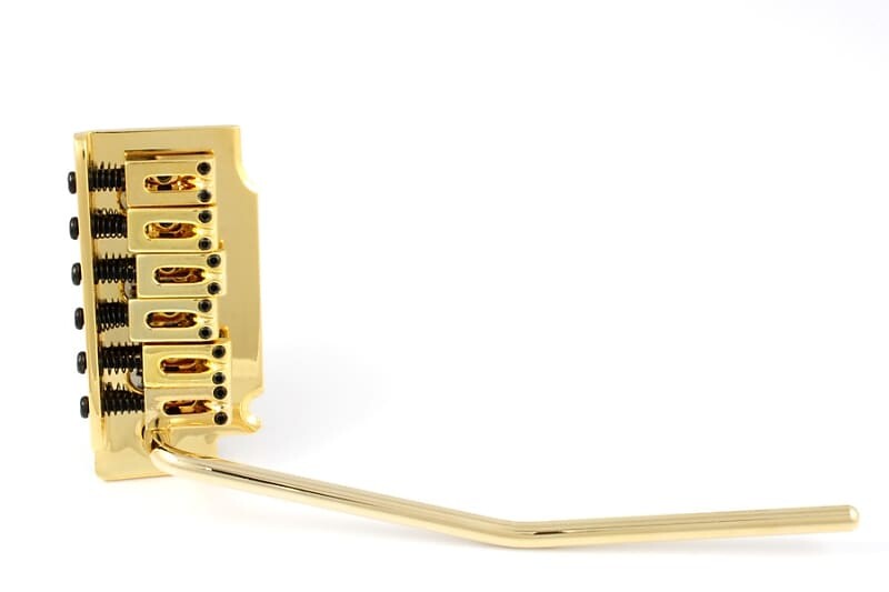 Гитарное тремоло Wilkinson Style с 2 стойками, расстояние между струнами 2-1/16 дюйма — ЗОЛОТО Allparts SB-5324-002
Гитарное тремоло Wilkinson Style с 2 стойками, расстояние между струнами 2-1/16 дюйма — ЗОЛОТО Allparts SB-5324-002