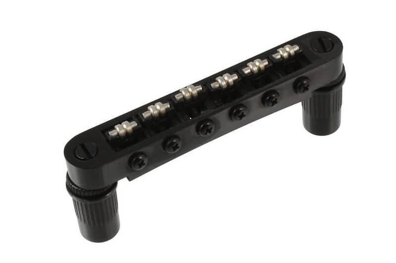 Бридж Tunematic For Gibson Les Paul, SG, Roller Saddles - ЧЕРНЫЙ Allparts GB-0596-003
Бридж Tunematic For Gibson Les Paul, SG, Roller Saddles - ЧЕРНЫЙ Allparts GB-0596-003