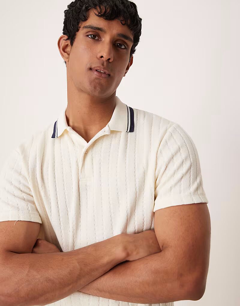 Свободное поло ASOS DESIGN с отложным воротником из бежевой трикотажной резинки
Свободное поло ASOS DESIGN с отложным воротником из бежевой трикотажной резинки