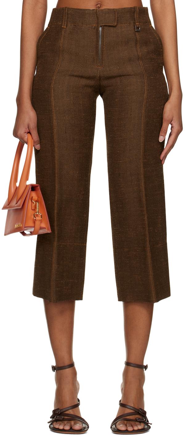 Коричневые брюки Le Raphia 'Le Pantalon Areia' JACQUEMUS
Коричневые брюки Le Raphia 'Le Pantalon Areia' JACQUEMUS