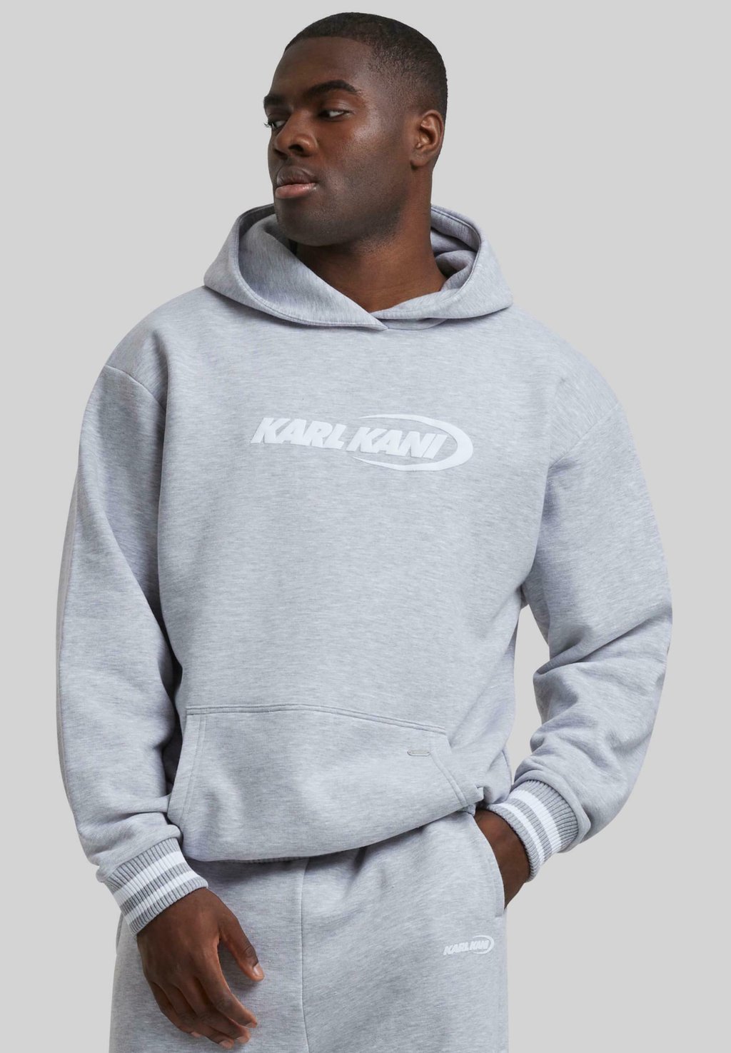 Толстовка с капюшоном ELLIPSE Karl Kani, серый/меланж
Толстовка с капюшоном ELLIPSE Karl Kani, серый/меланж