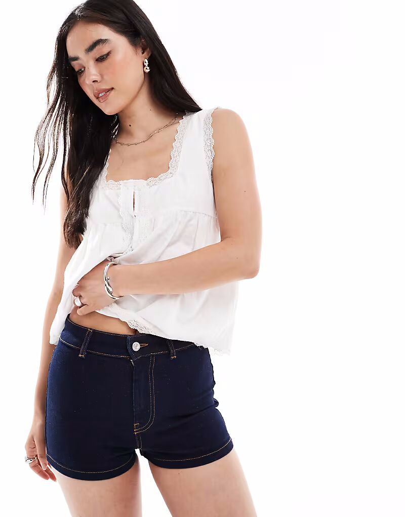 Микрошорты из эластичного денима средней посадки цвета индиго Asos Design
Микрошорты из эластичного денима средней посадки цвета индиго Asos Design