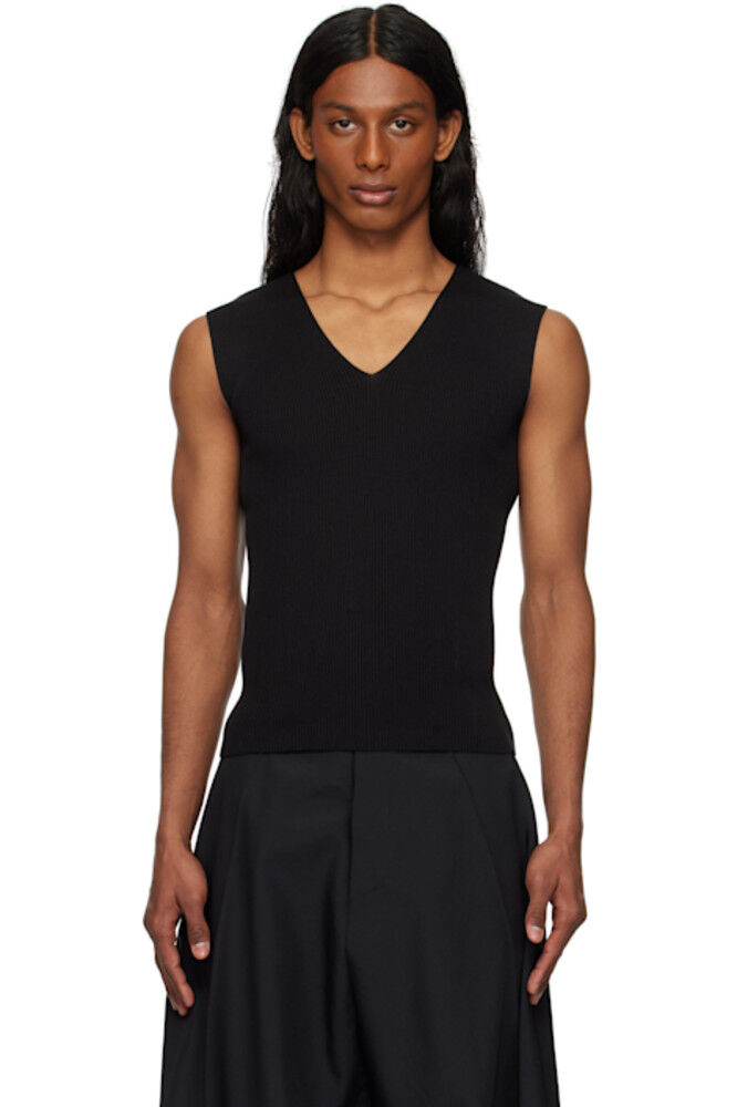 Черный свитер с плоской резинкой 2 132 5. ISSEY MIYAKE
Черный свитер с плоской резинкой 2 132 5. ISSEY MIYAKE