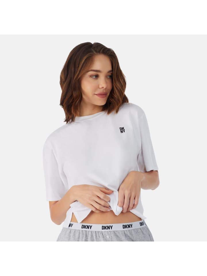 DKNY Белый топ - обязательный элемент гардероба
DKNY Белый топ - обязательный элемент гардероба