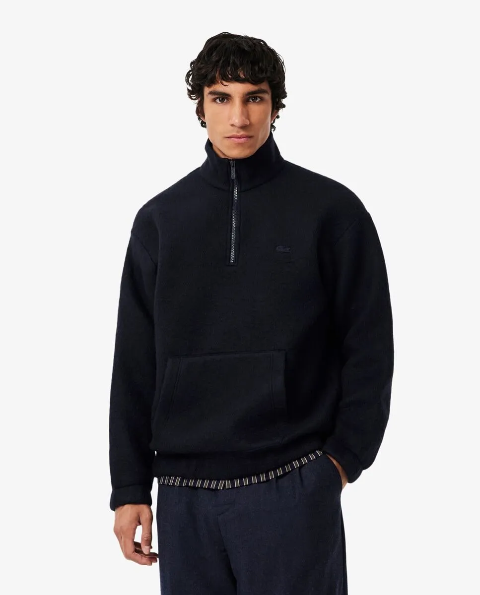 Мужская шерстяная толстовка с молнией на воротнике синего цвета Lacoste
Мужская шерстяная толстовка с молнией на воротнике синего цвета Lacoste