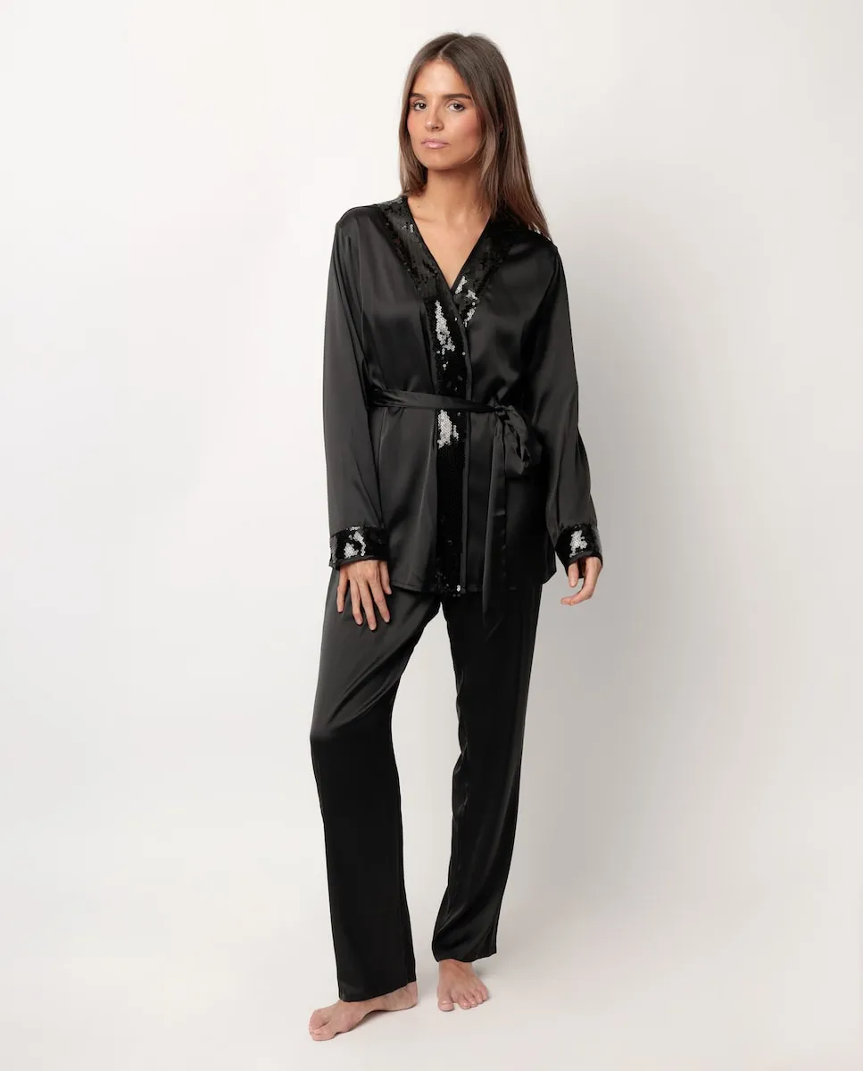Длинная женская пижама из черного атласного материала Admas
Длинная женская пижама из черного атласного материала Admas