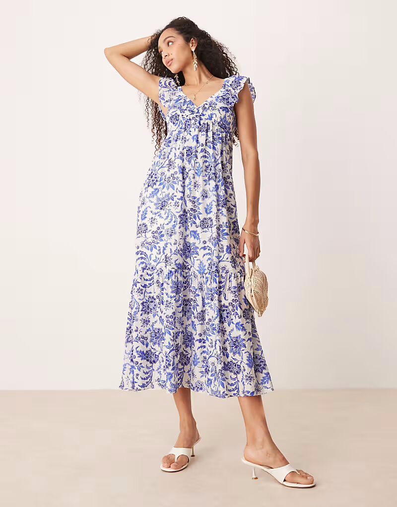 Платье миди с оборками на рукавах Mango и синим растительным принтом
Платье миди с оборками на рукавах Mango и синим растительным принтом