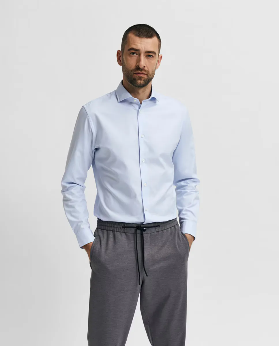 Мужская однотонная хлопковая классическая рубашка приталенного кроя Selected, светло-голубой
Мужская однотонная хлопковая классическая рубашка приталенного кроя Selected, светло-голубой