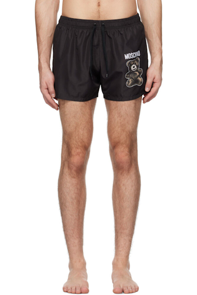 Черные шорты для плавания с плюшевым мишкой Moschino
Черные шорты для плавания с плюшевым мишкой Moschino
