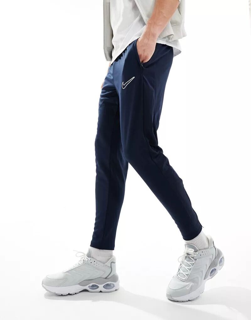 Темно-синие спортивные брюки Nike Academy Dri-FIT
Темно-синие спортивные брюки Nike Academy Dri-FIT