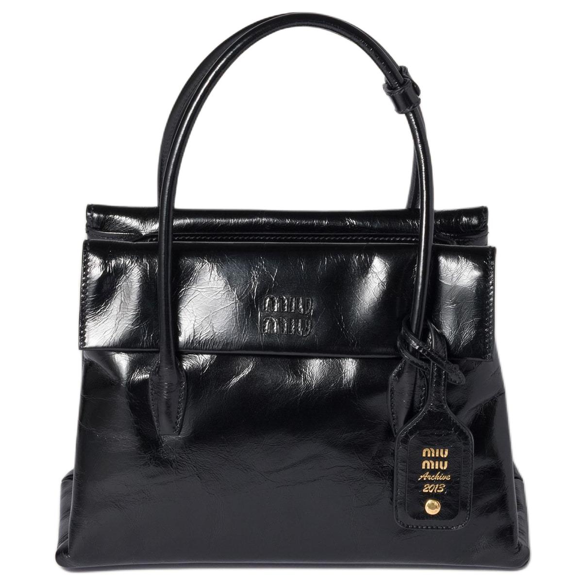 MIU MIU Женская сумка из телячьей кожи черная 
MIU MIU Женская сумка из телячьей кожи черная