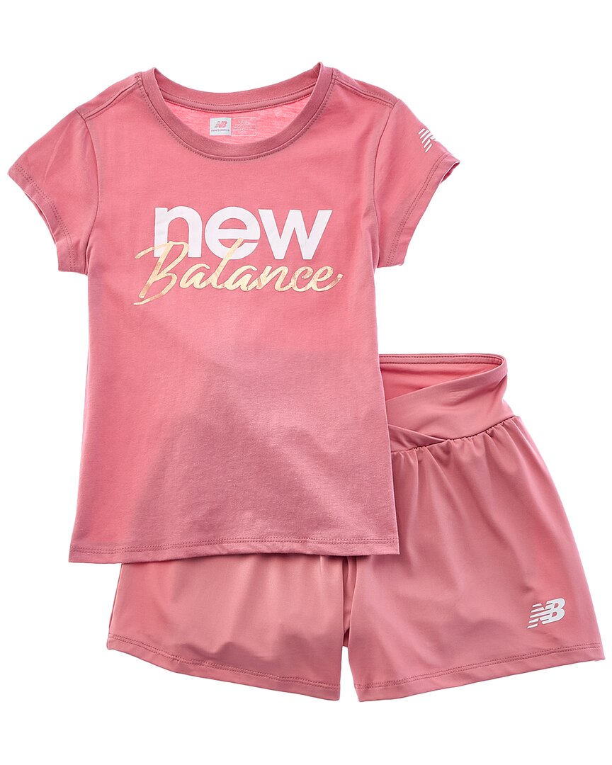 New Balance Комплект из футболки и шорт, розовый
New Balance Комплект из футболки и шорт, розовый
