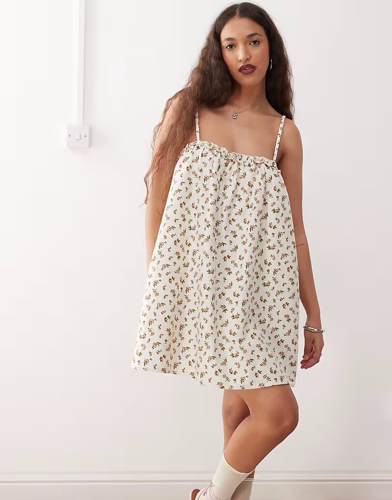 Белое платье мини с цветочным принтом Motel kamalani
Белое платье мини с цветочным принтом Motel kamalani