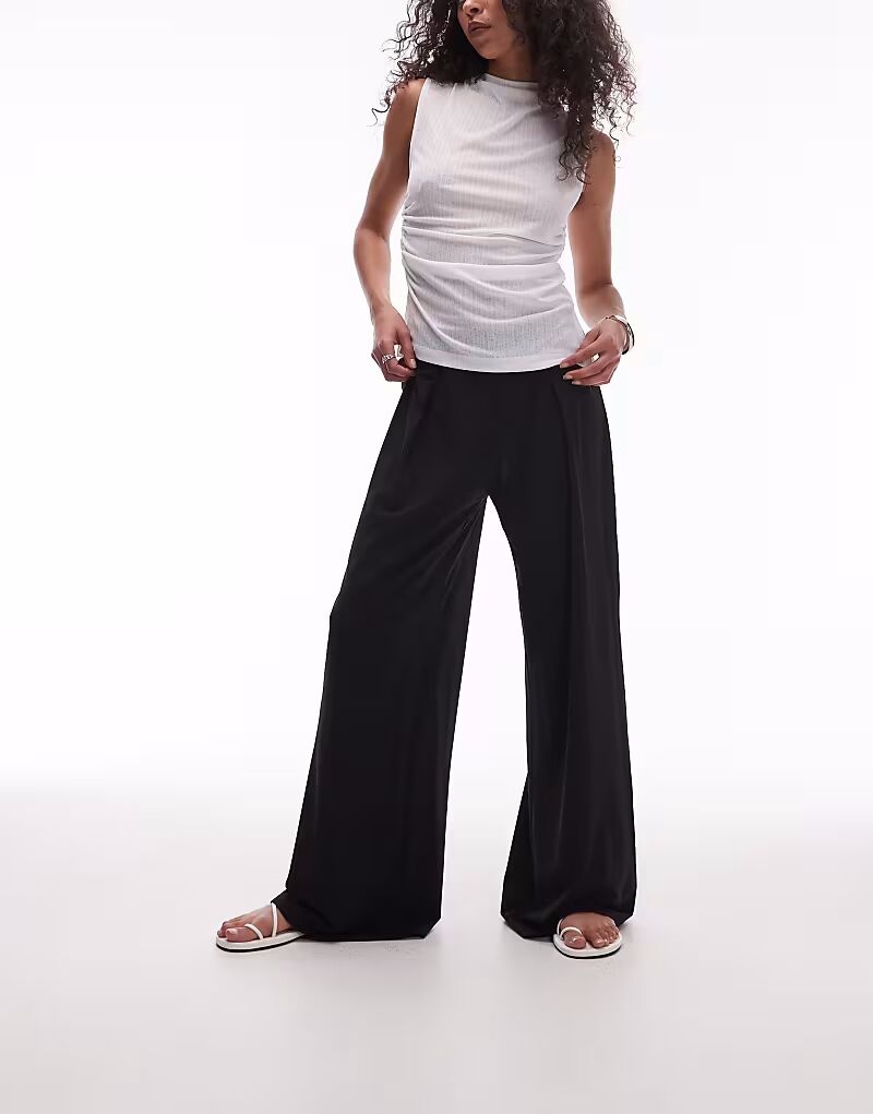 Широкие брюки-стрейч Mango с эластичной талией черного цвета 
Широкие брюки-стрейч Mango с эластичной талией черного цвета