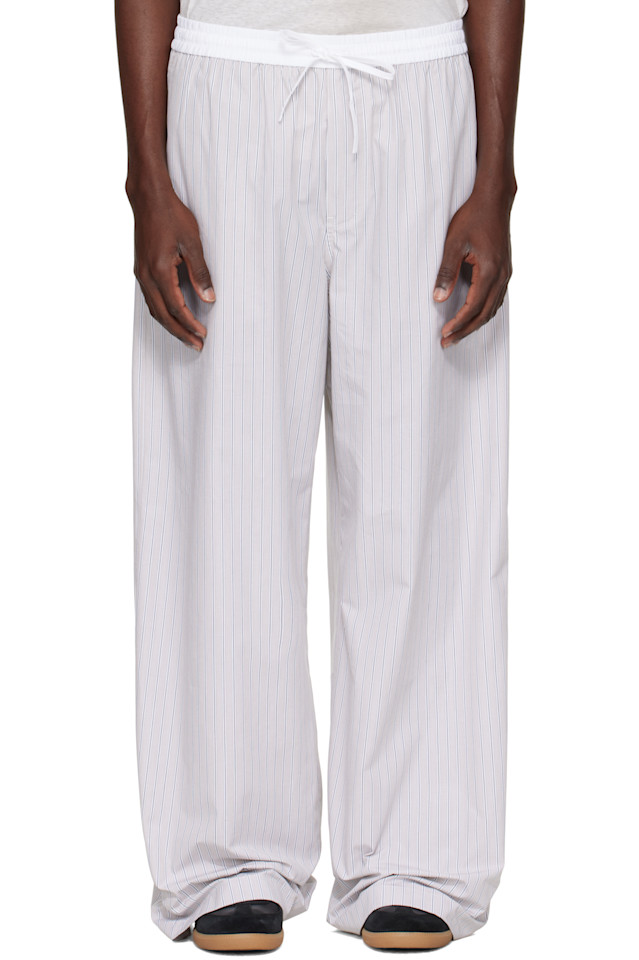 Acne Studios Серые полосатые брюки
Acne Studios Серые полосатые брюки