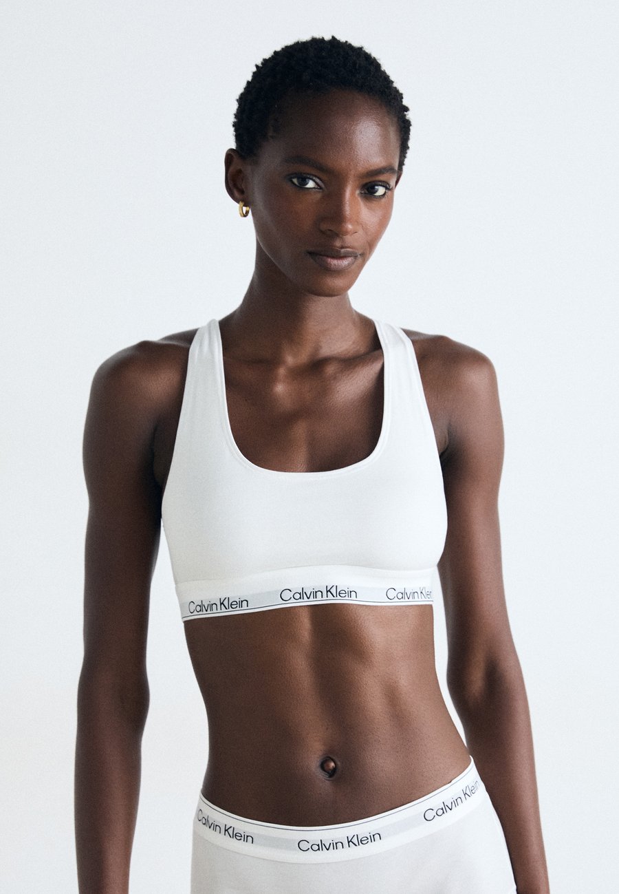 Бюстье Calvin Klein Underwear UNLINED BRALETTE ICON COTTON MODAL, White
Бюстье Calvin Klein Underwear UNLINED BRALETTE ICON COTTON MODAL, White