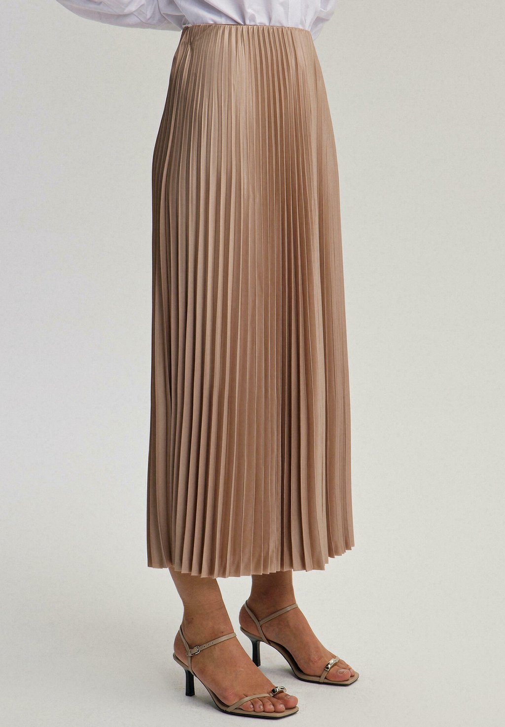 Юбка плиссированная Gonna a campana Touché Privé, песочный
Юбка плиссированная Gonna a campana Touché Privé, песочный