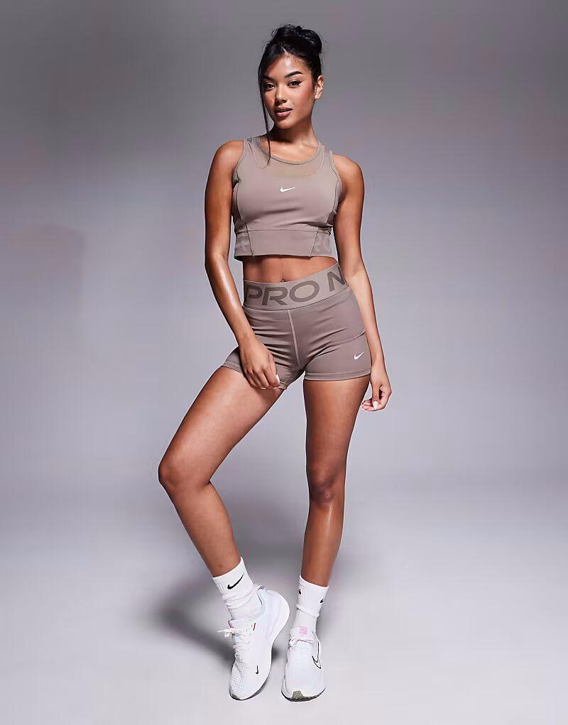 Коричневые шорты-леггинсы Nike Pro Training Dri-FIT Sculpt с высокой посадкой и шириной 3 дюйма
Коричневые шорты-леггинсы Nike Pro Training Dri-FIT Sculpt с высокой посадкой и шириной 3 дюйма