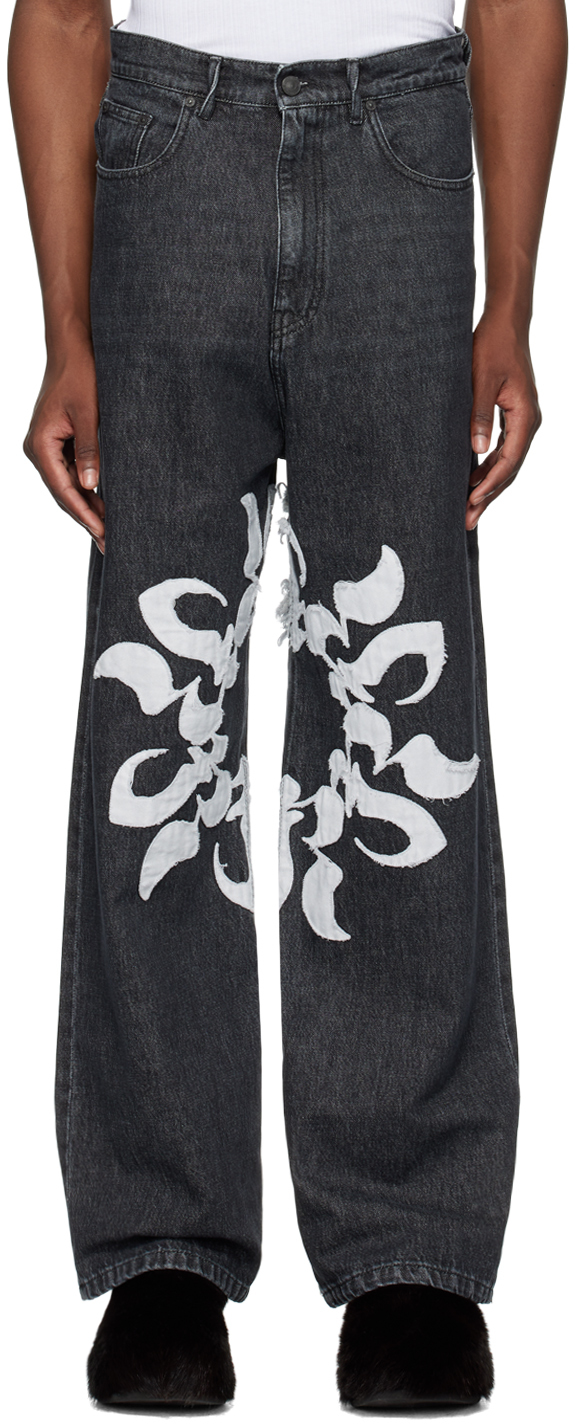 Джинсы с заплатками KUSIKOHC
Джинсы с заплатками KUSIKOHC