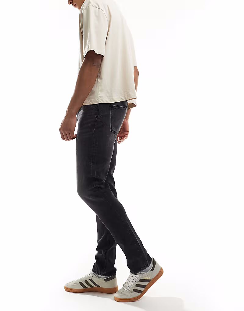 Узкие джинсы ASOS DESIGN черного цвета
Узкие джинсы ASOS DESIGN черного цвета