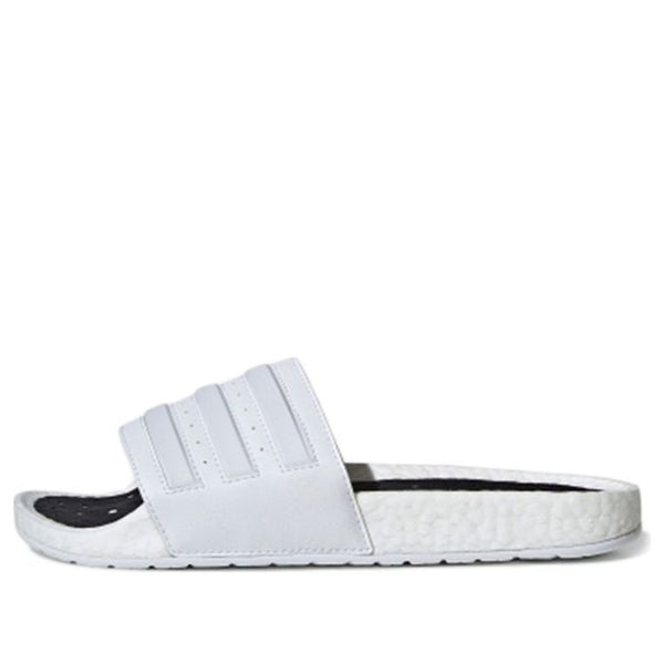 Тапочки adilette boost slides 'cloud white' Adidas, белый
Тапочки adilette boost slides 'cloud white' Adidas, белый