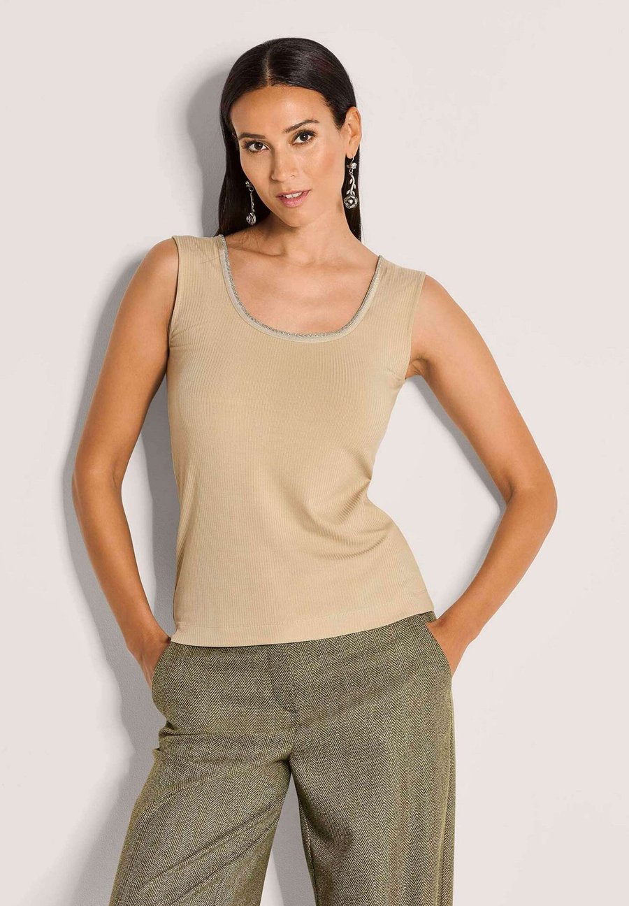 Топ MADELEINE TRÄGER KOMFORTABLES MIT KETTENDETAIL, Beige
Топ MADELEINE TRÄGER KOMFORTABLES MIT KETTENDETAIL, Beige