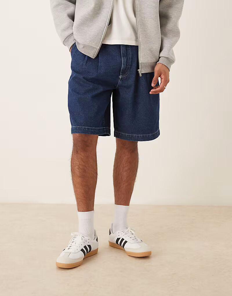 Широкие джинсовые шорты средней длины со складками ASOS DESIGN темно-синего цвета
Широкие джинсовые шорты средней длины со складками ASOS DESIGN темно-синего цвета