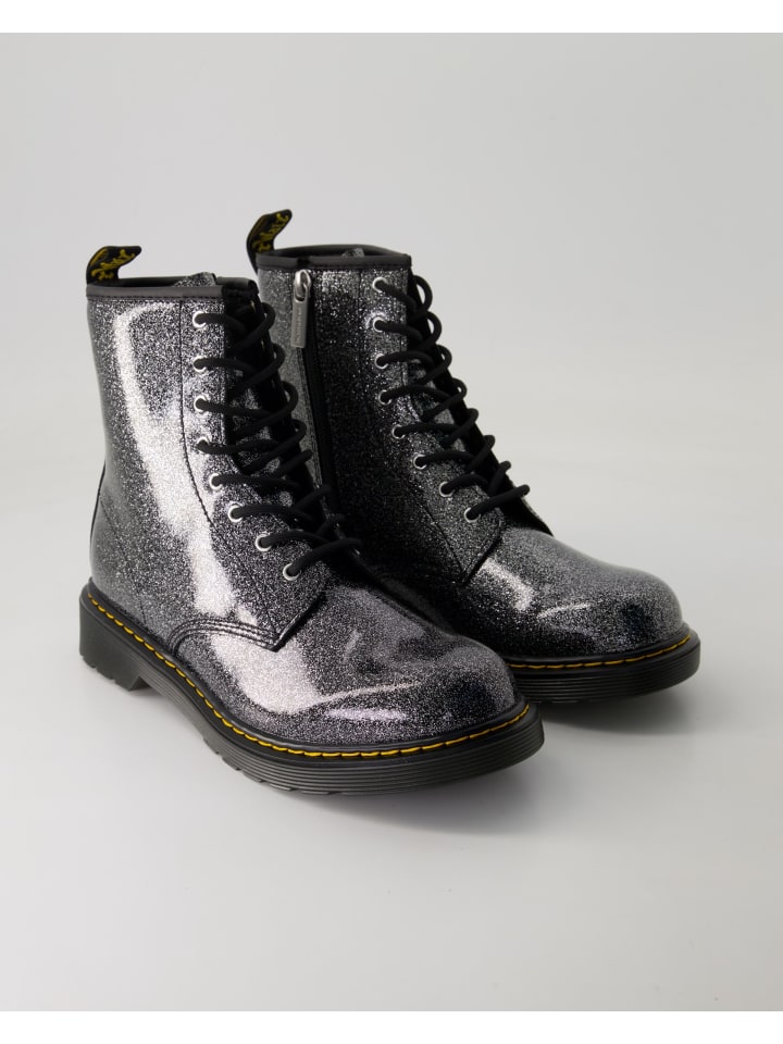 Ботинки на шнуровке серебристого цвета Dr. Martens
Ботинки на шнуровке серебристого цвета Dr. Martens