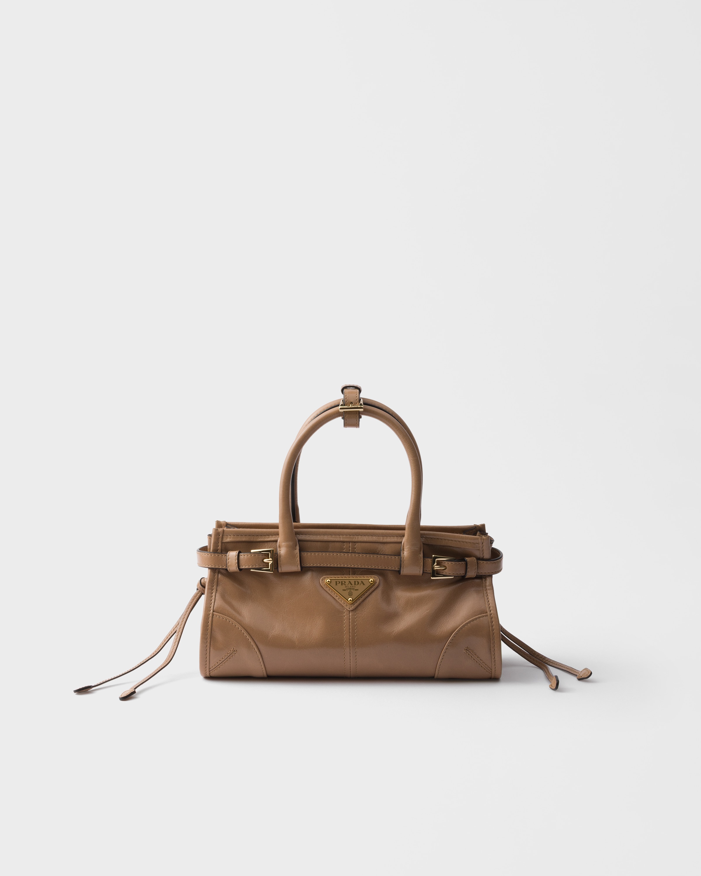 Мини-сумка Prada Bonnie из кожи, бежевый
Мини-сумка Prada Bonnie из кожи, бежевый
