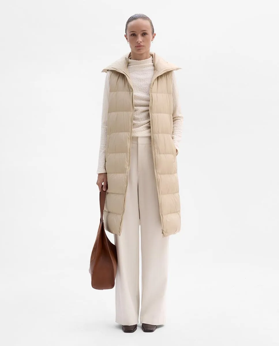 Длинный женский стеганый жилет Simorra, бежевый
Длинный женский стеганый жилет Simorra, бежевый