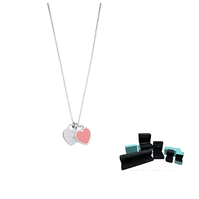 TIFFANY & CO. Кулон из стерлингового серебра 925 пробы с розовым сердечком из коллекции Return To Tiffany
TIFFANY & CO. Кулон из стерлингового серебра 925 пробы с розовым сердечком из коллекции Return To Tiffany