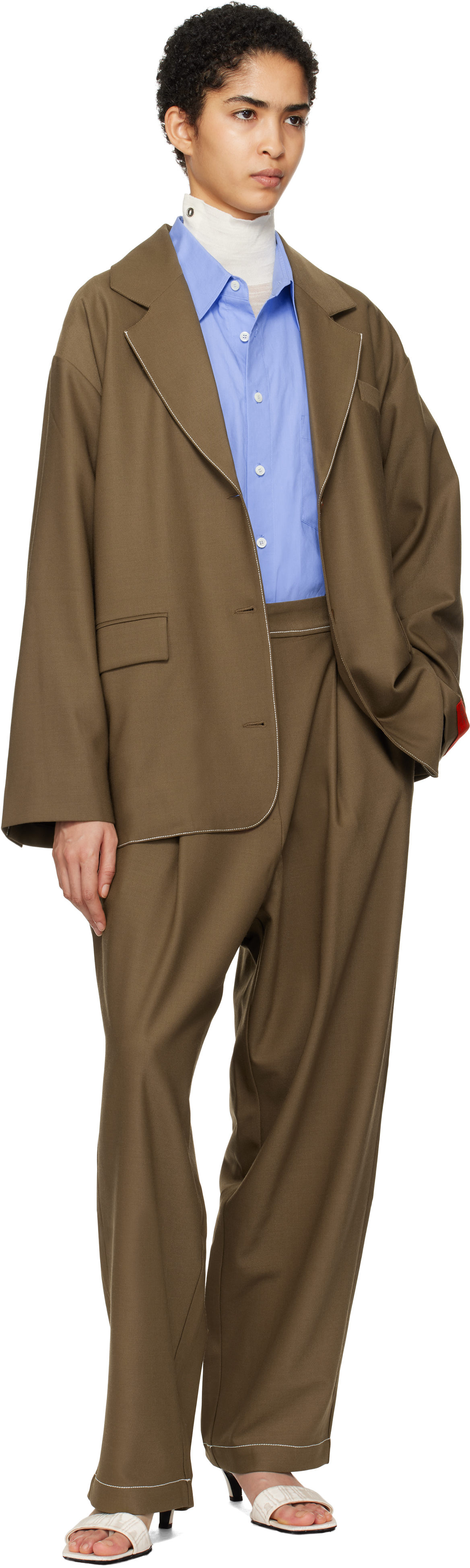 Коричневые брюки с отделкой по крою Cordera
Коричневые брюки с отделкой по крою Cordera