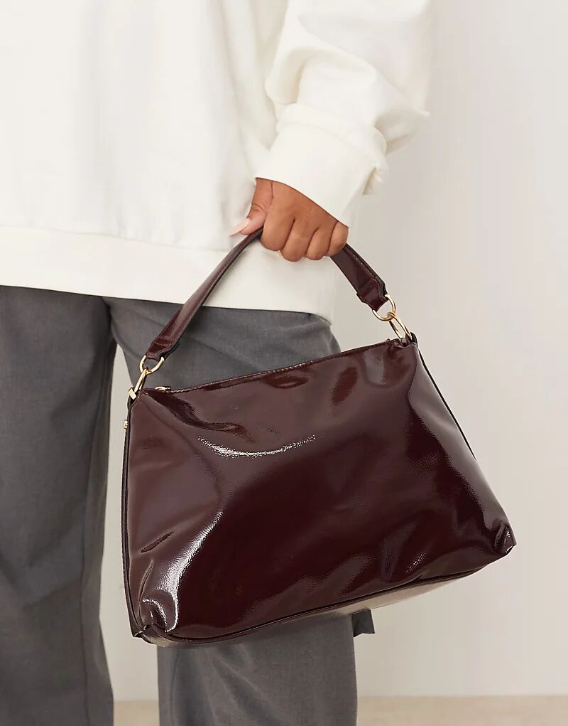 Лакированная сумка Accessorize с широким ремешком бордового цвета
Лакированная сумка Accessorize с широким ремешком бордового цвета