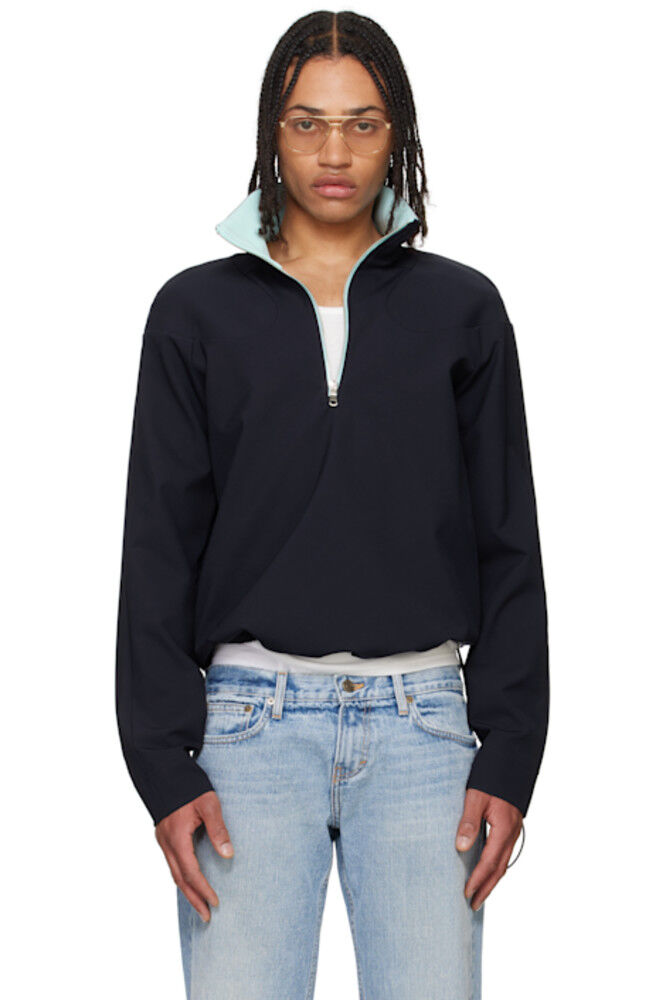 Темно-синяя толстовка с подкладкой на плечах и застежкой-молнией на четверть длины Raimundo Langlois
Темно-синяя толстовка с подкладкой на плечах и застежкой-молнией на четверть длины Raimundo Langlois