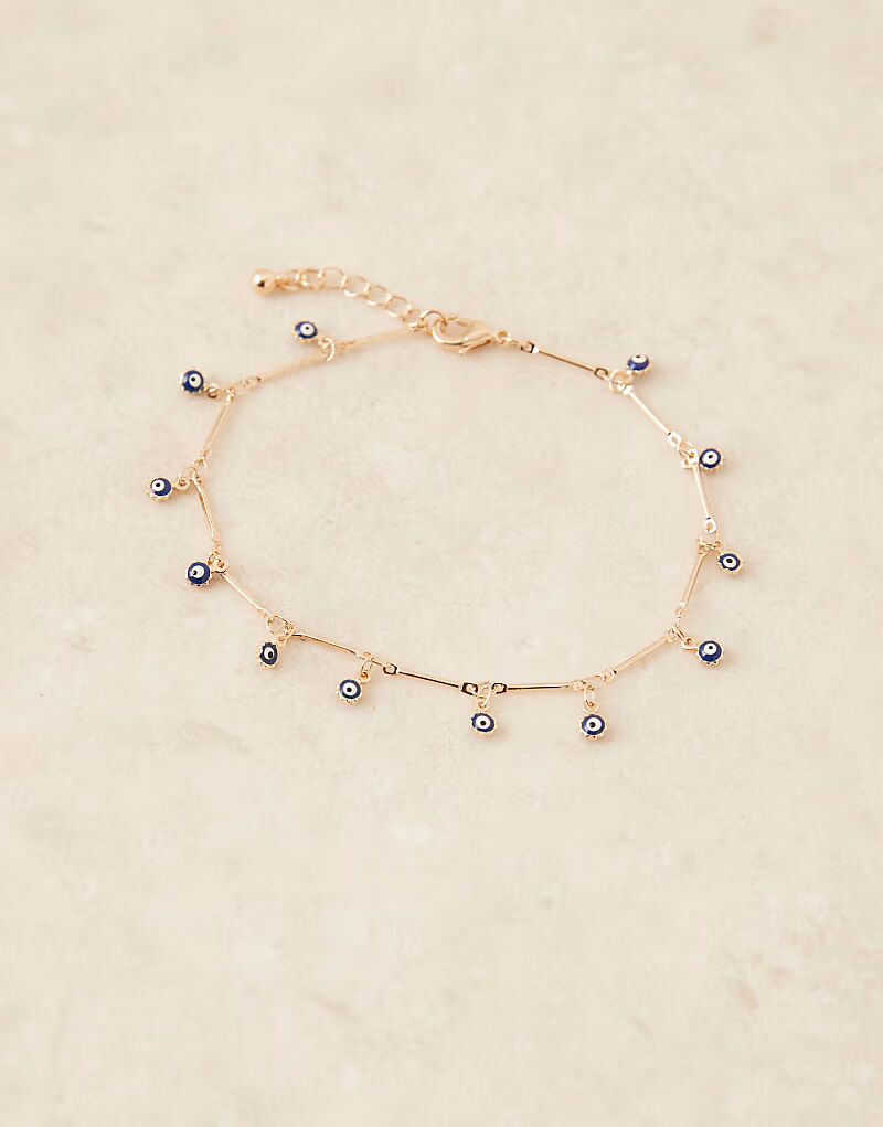 Браслет на лодыжку с ушком и тонкой цепочкой в золотистом оттенке Asos Design
Браслет на лодыжку с ушком и тонкой цепочкой в золотистом оттенке Asos Design