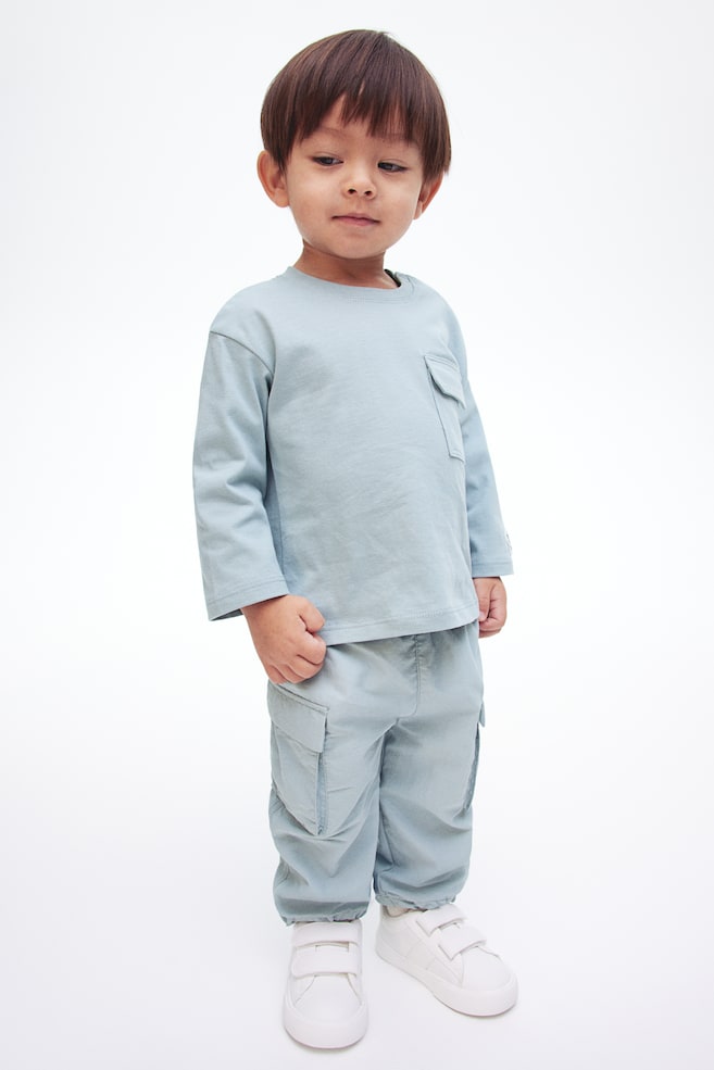 Спортивные брюки карго H&M, бирюзовый
Спортивные брюки карго H&M, бирюзовый