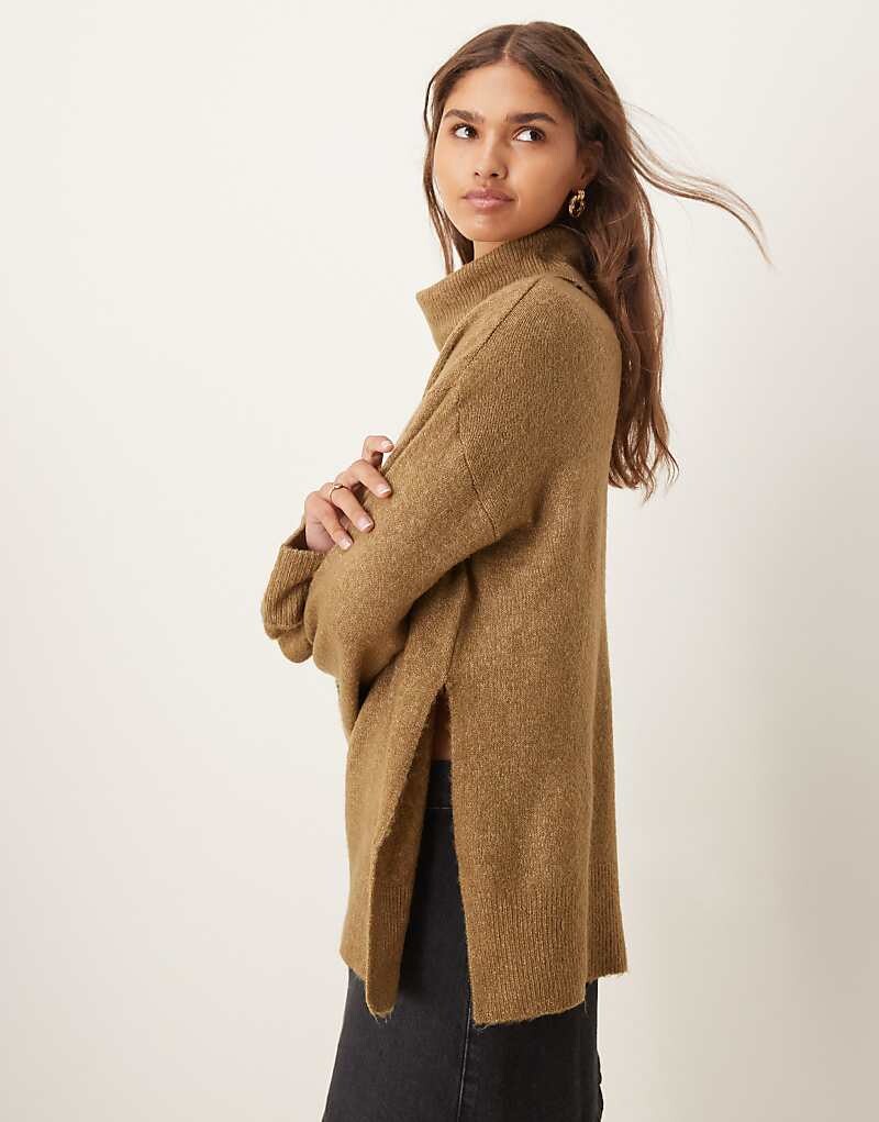 VILA – свитер оверсайз зеленого меланжа с водолазкой и отворотами на манжетах
VILA – свитер оверсайз зеленого меланжа с водолазкой и отворотами на манжетах