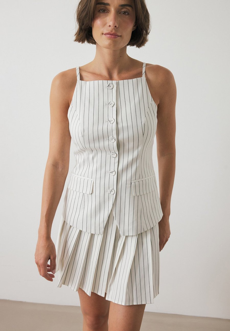 Юбка NA-KD A-line skirt, Cream Black/White
Юбка NA-KD A-line skirt, Cream Black/White