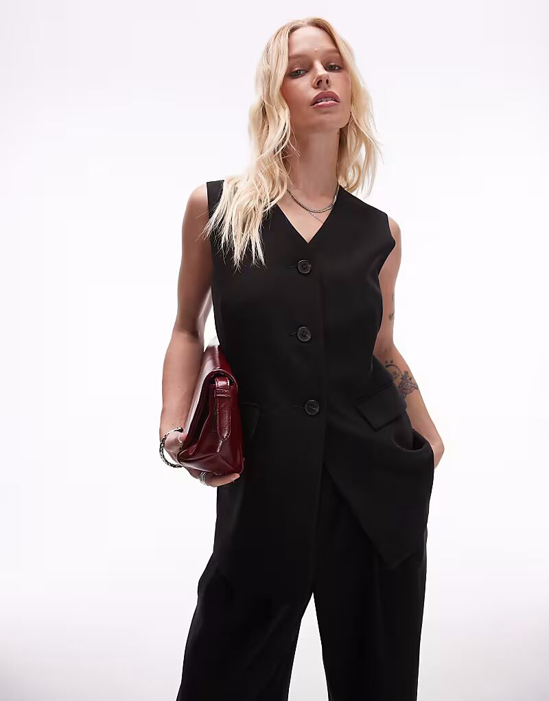 Приталенный удлиненный жилет Topshop черного цвета
Приталенный удлиненный жилет Topshop черного цвета