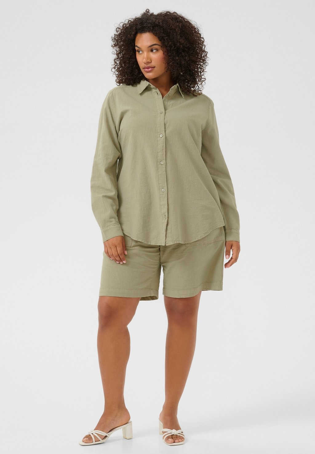 Блузка на пуговицах Kaffe Curve, светло-зеленый
Блузка на пуговицах Kaffe Curve, светло-зеленый